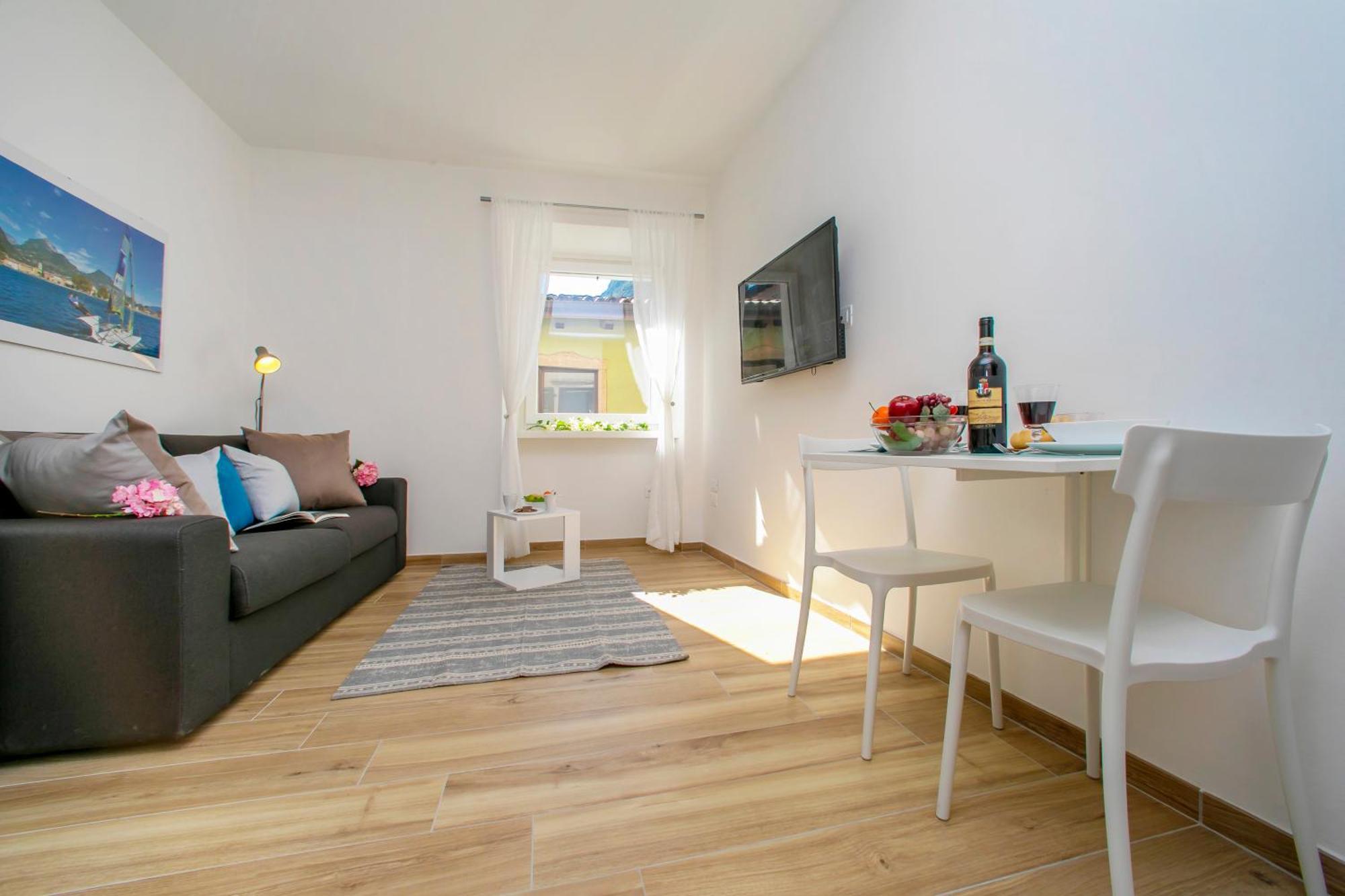 Nido Sui Tetti Di Riva Del Garda - Happy Rentals Buitenkant foto