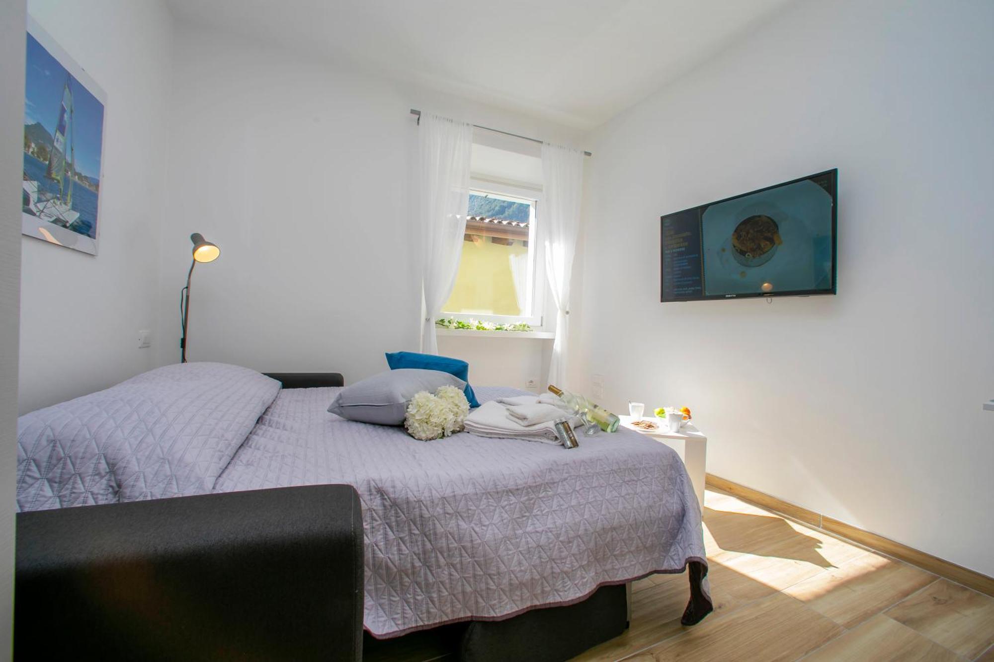 Nido Sui Tetti Di Riva Del Garda - Happy Rentals Buitenkant foto