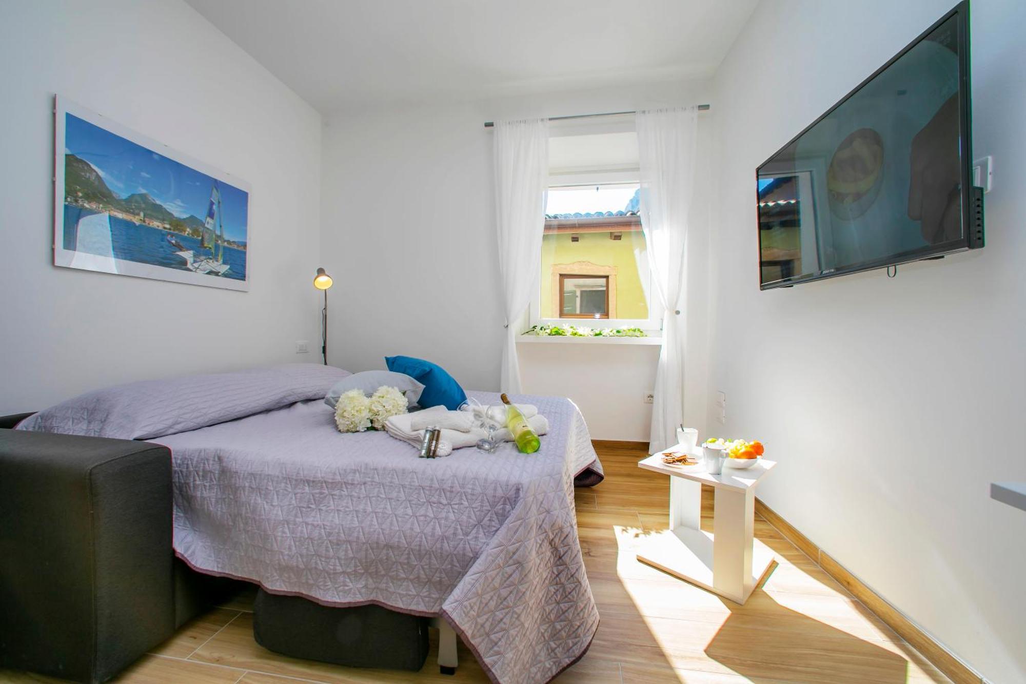 Nido Sui Tetti Di Riva Del Garda - Happy Rentals Buitenkant foto